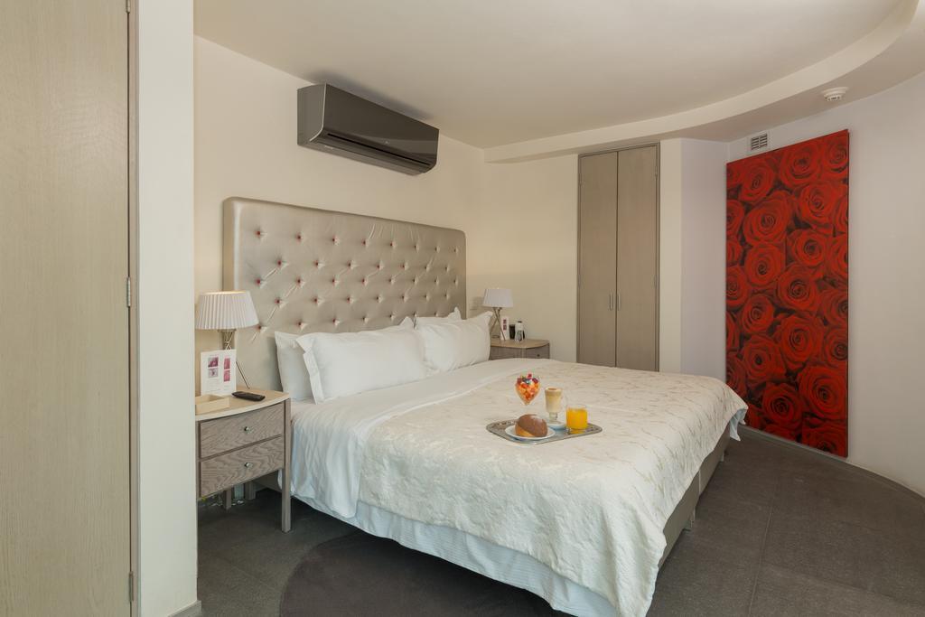 Suites Contempo Meksyk Zewnętrze zdjęcie A bedroom at the hotel