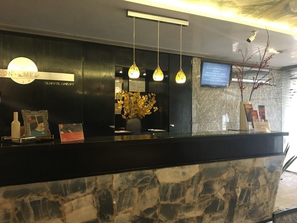 Suites Contempo Meksyk Zewnętrze zdjęcie Reception desk at the hotel